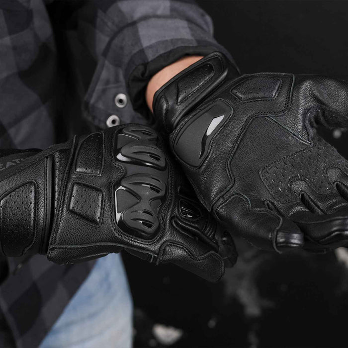 Leatherick CE certified men's black motorbike protective gloves showing reinforced knuckle armour and palm sliders for enhanced impact protection.