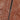 A detailed close-up of a heavy-duty metal front zip on a brown Victor buffalo leather jacket.