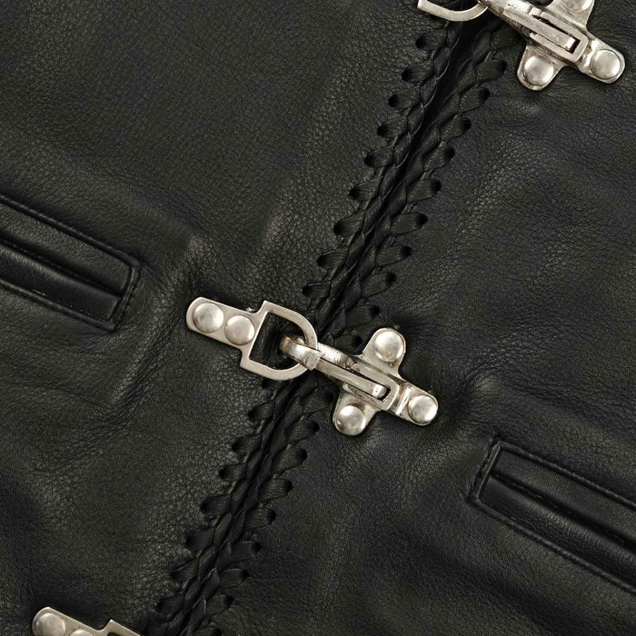 Close-up view of black leather side laces passing through 28 shiny silver eyelets on the Short Body Fish Hook Waistcoat.