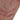 Close-up of a secure zipped side pocket on a Hooper brown leather jacket showing the soft grain texture.