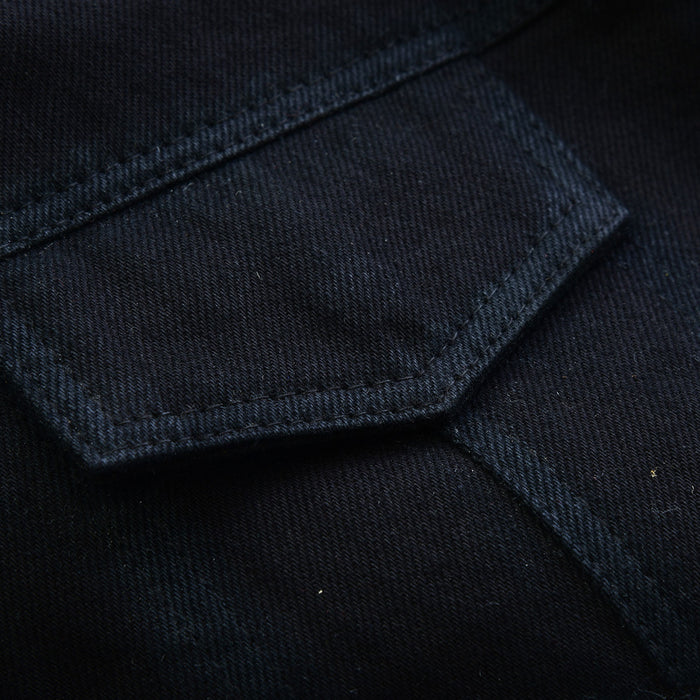 Deep pockets with snap closure, stitched seams, and an elastic band for secure storage inside the waistcoat.