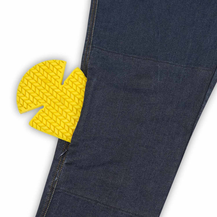 A close-up view of the external knee protector pocket on men's blue single-layer motorcycle riding jeans with a yellow protective armor insert partially visible.